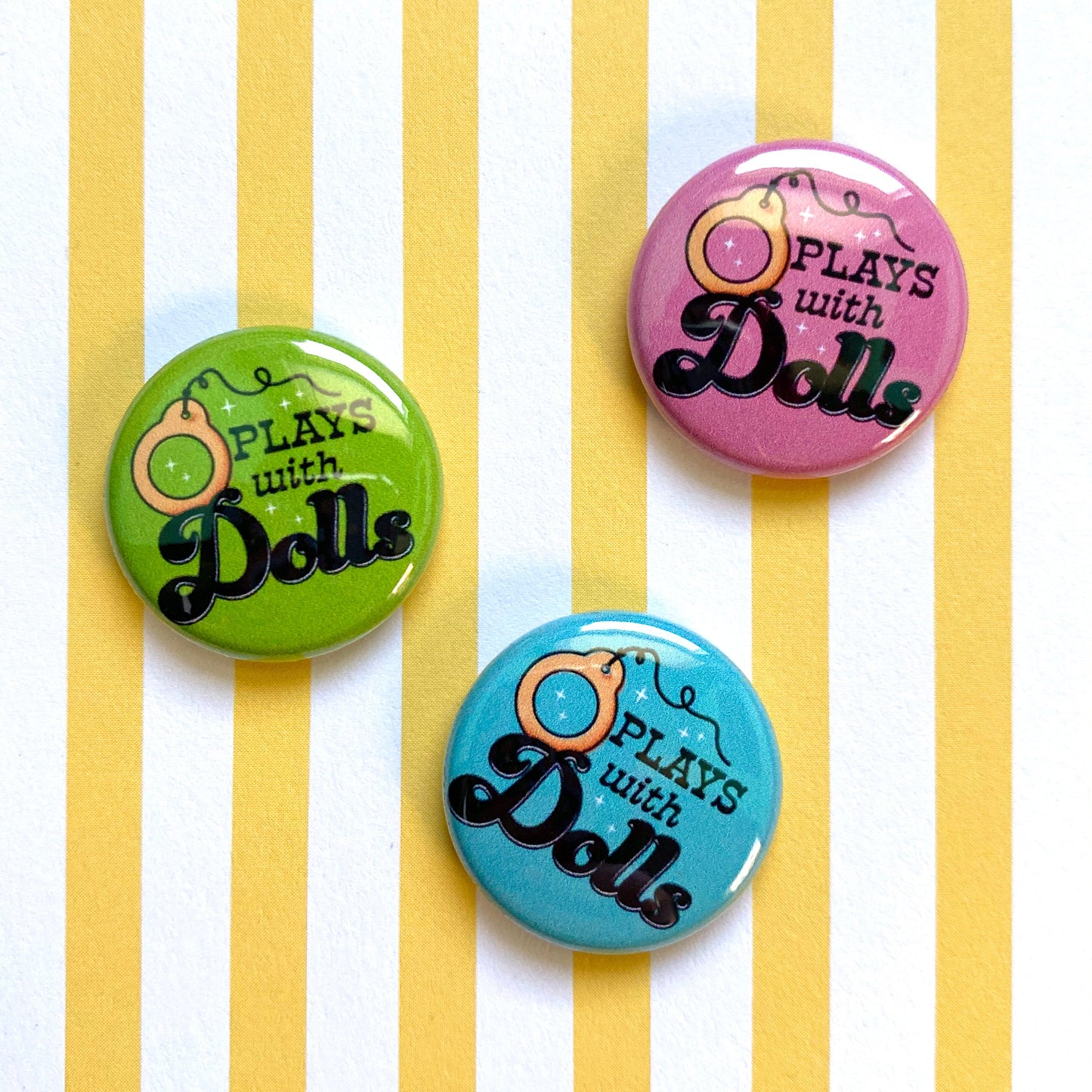Plays With Dolls 1" Pin