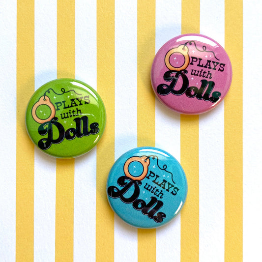 Plays With Dolls 1" Pin