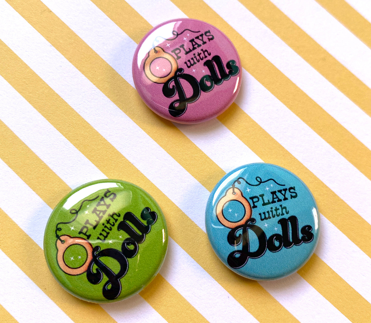 Plays With Dolls 1" Pin